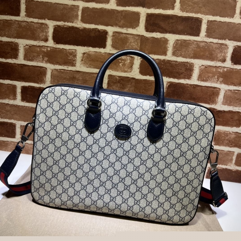 G*u*i top handle bags